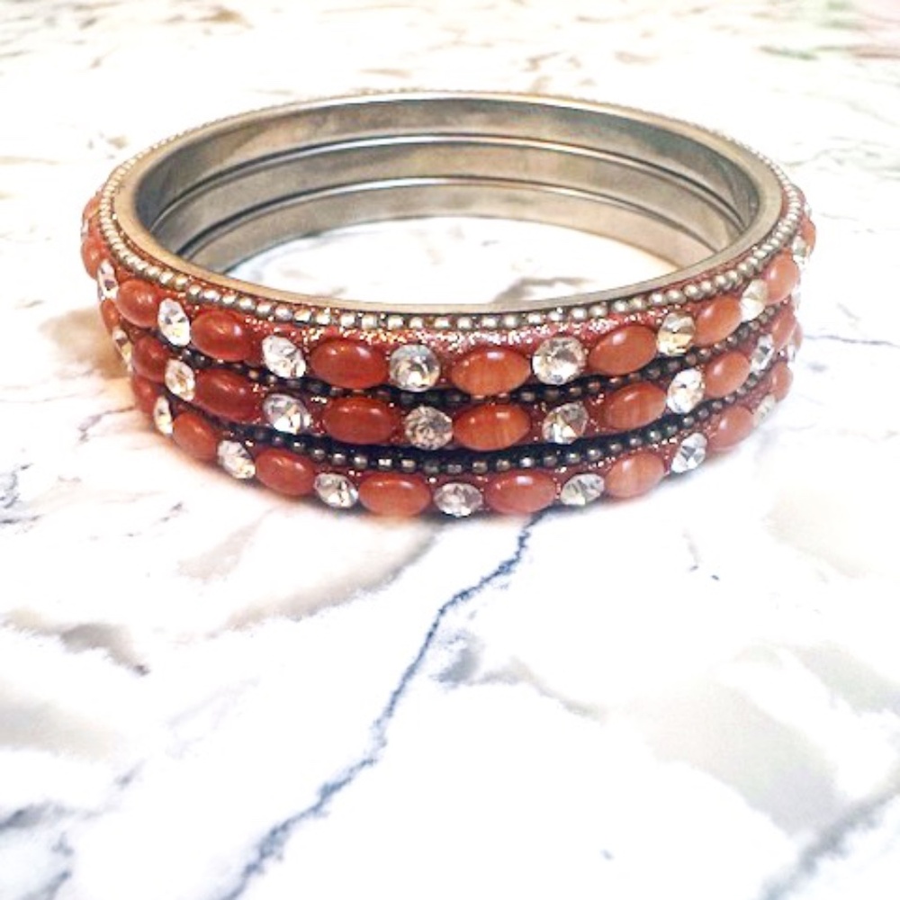 3 Gilt Group Bracelets